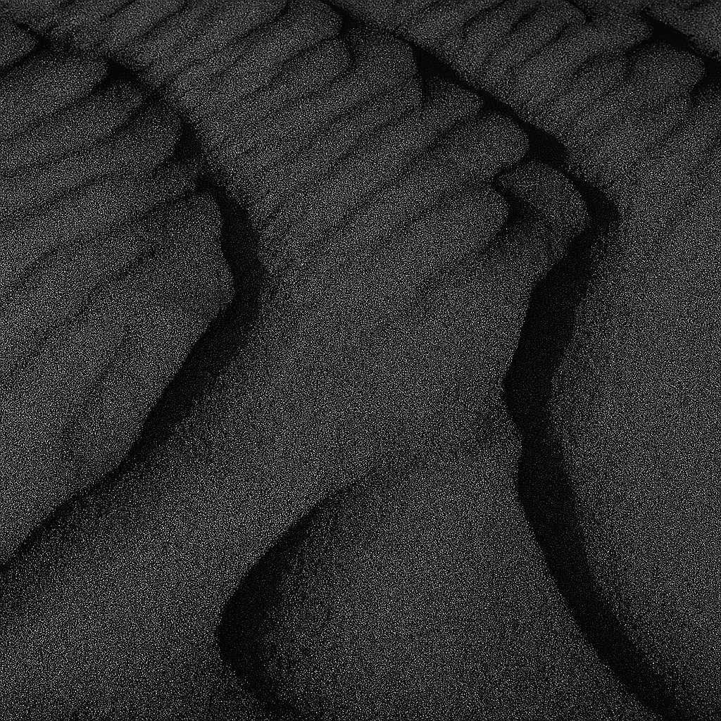 Textured black volcanic sand resembling waves, showcasing the natural beauty of Iceland's landscape.